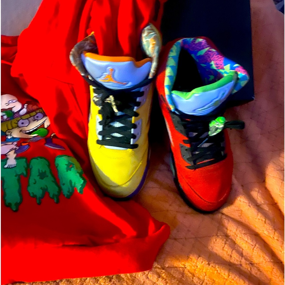 Yellow and red Jordans five